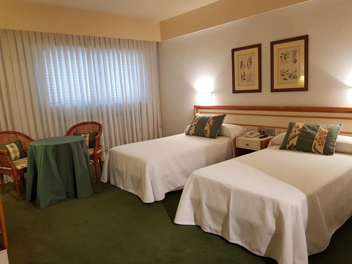 hotel-jopi–habitacion-camas